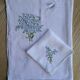 Hand-embroidered table duo in linen voile – Azure Bouquet & Butterfly