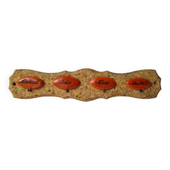 Cork and orange ceramic tea towel hanger