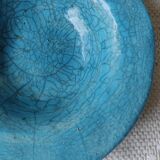 Empty turquoise raku pocket