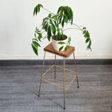 Small harness, brass plant holder and wood