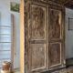 The antique patinated wardrobe