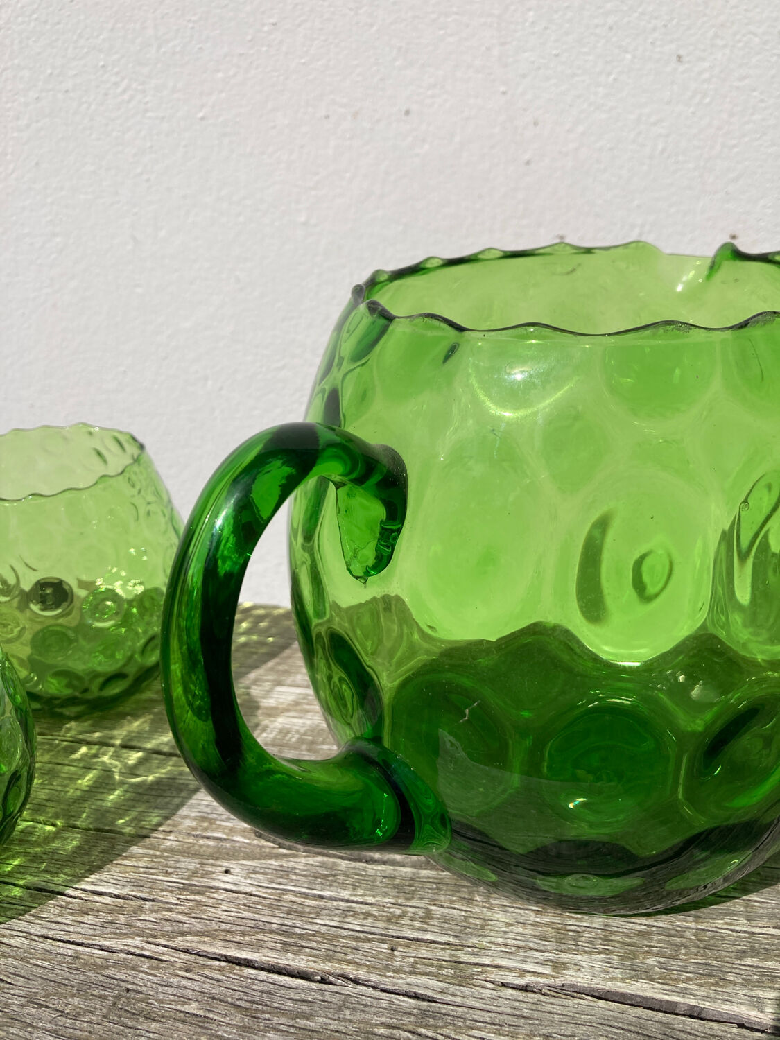 4 green water glasses and vintage blown glass carafe