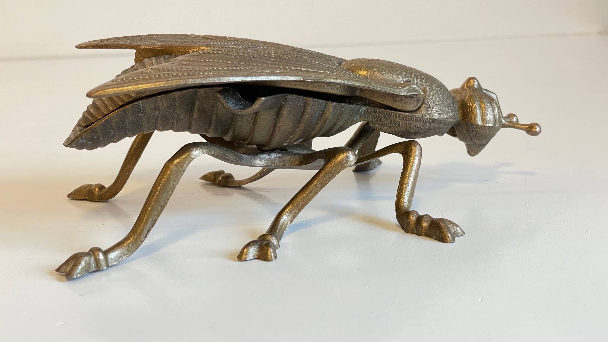 Vintage fly ashtray in patinated metal