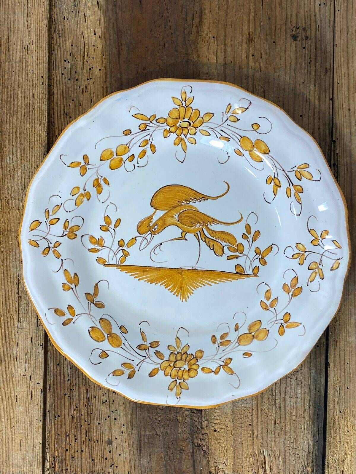Set of 6 earthenware plates from Moustiers, featuring birds and flowers.