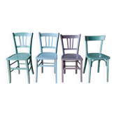 Set of four mismatched bistro chairs