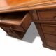 Oak desk with 9 drawers and leather writing pad.