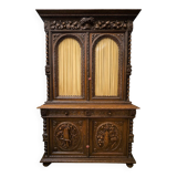 Two-body buffet in solid oak, richly carved in the Renaissance style.