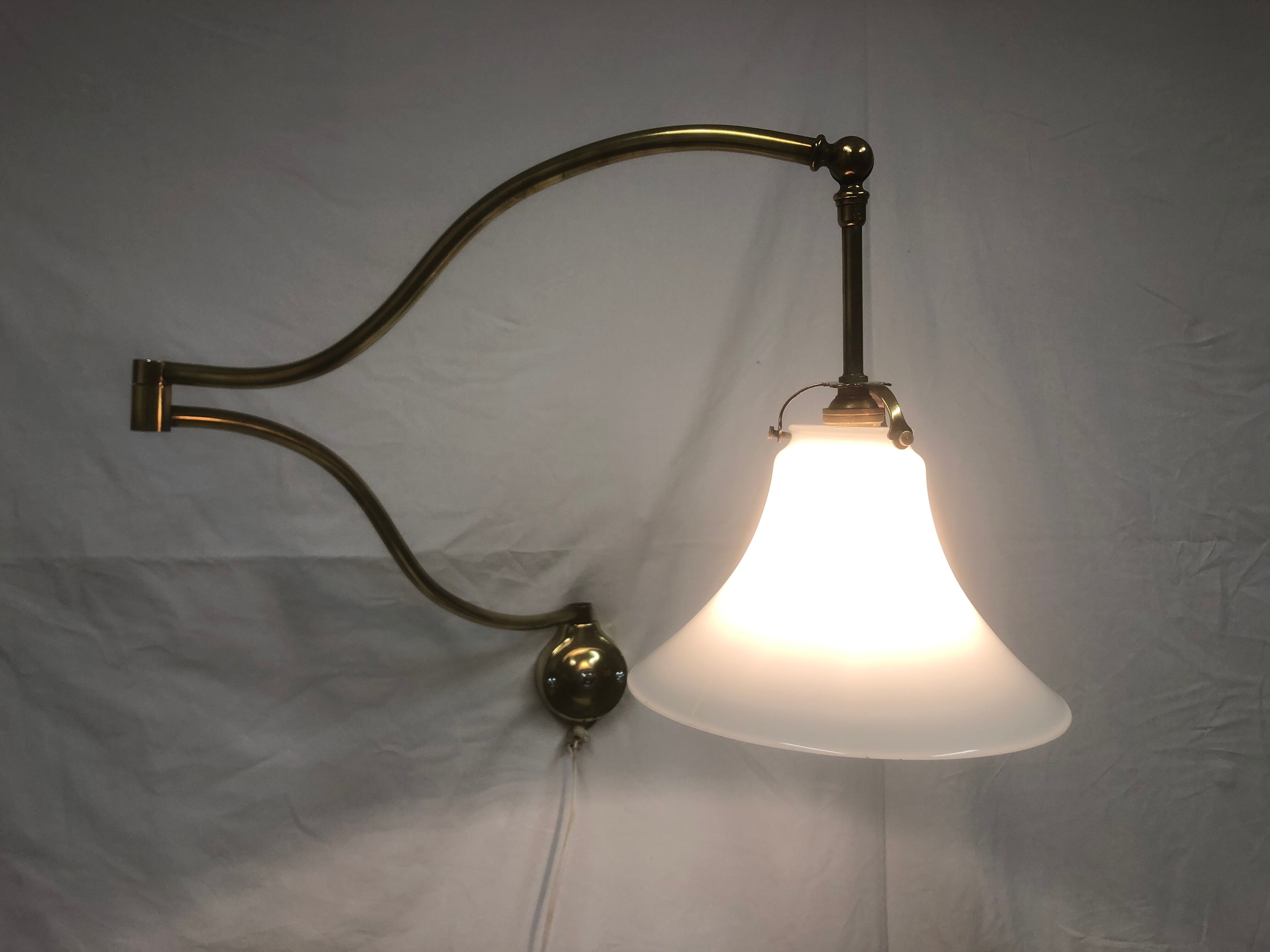 Articulated brass sconce 1950