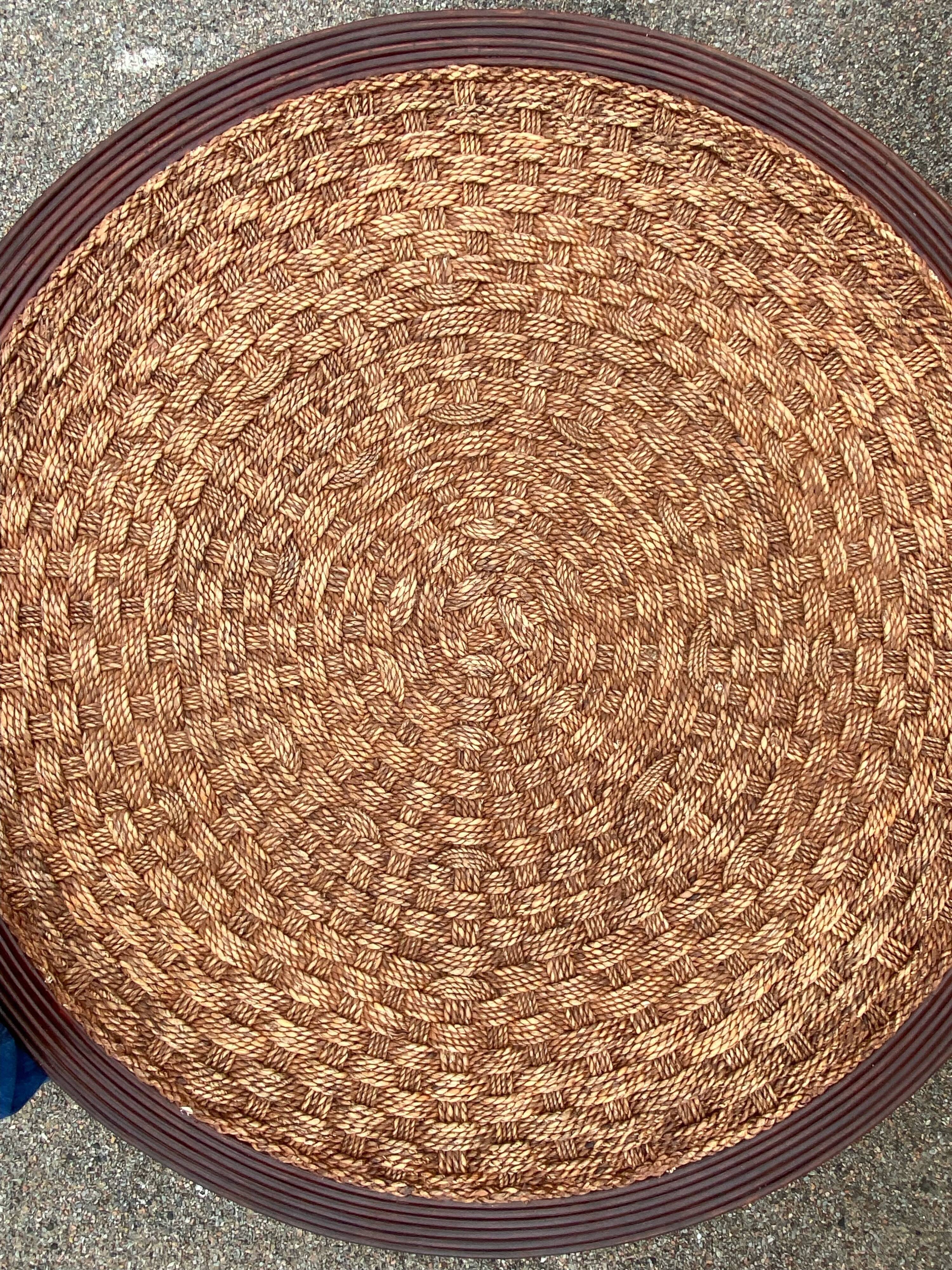 A coffee table and four rope stools 1960/1970