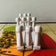 Vintage accordion coat rack in white painted wood