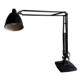 Lampe de bureau articulée de style industriel vintage en métal noir avec base en fonte et bras réglable