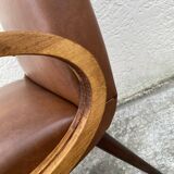 Mid-Century Scandinavian vintage retro armchair with oval armrests.