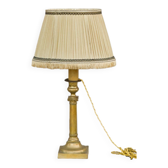 Candle holder mounted as a lamp