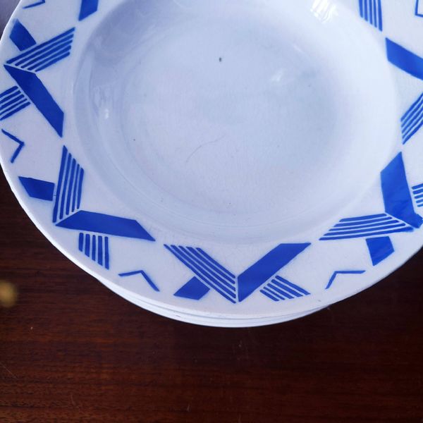 11 assiettes creuses art deco en faience K&G Luneville