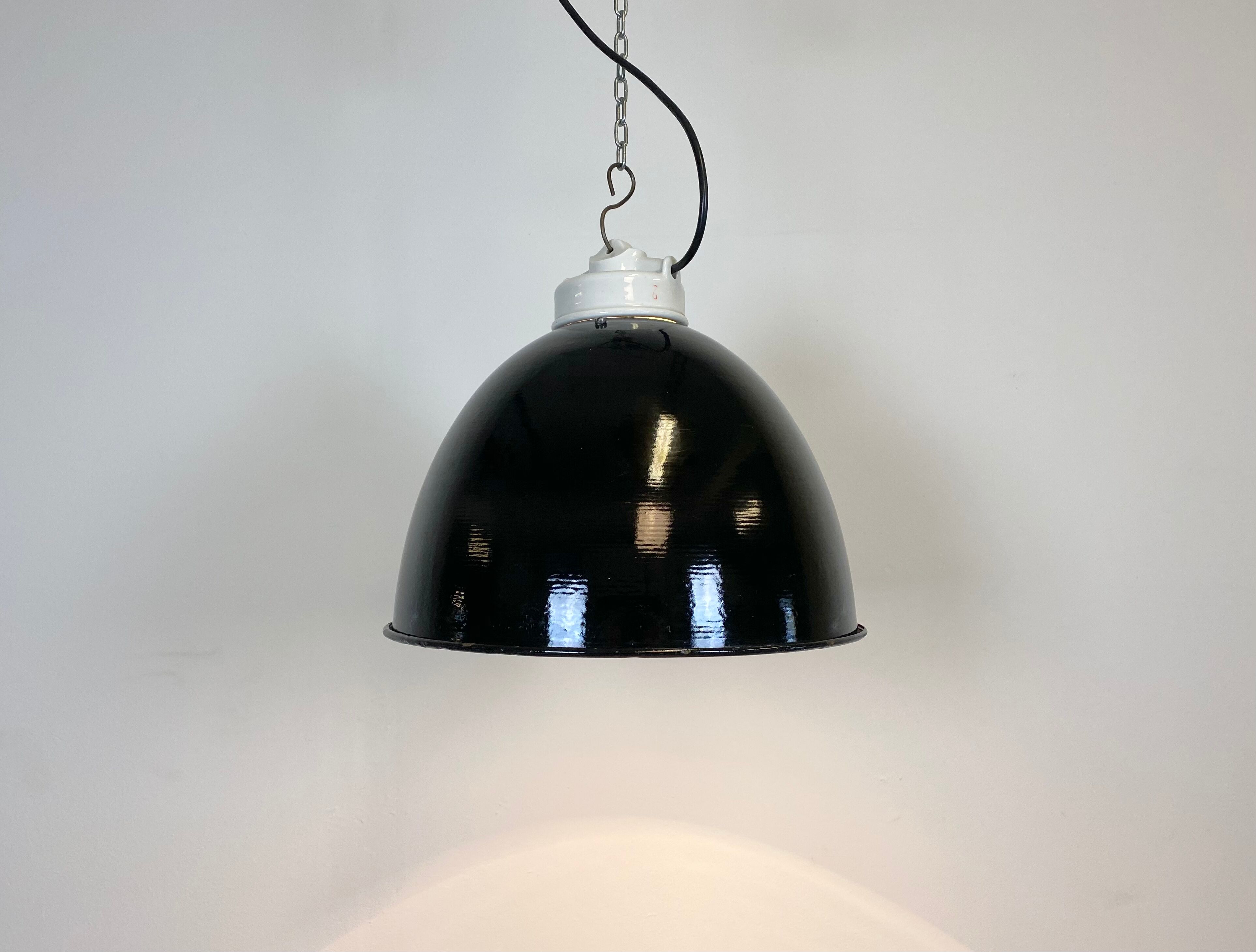 Industrial black enamel lamp with porcelain top, 1950s