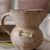 Small pitcher in old speckled stoneware