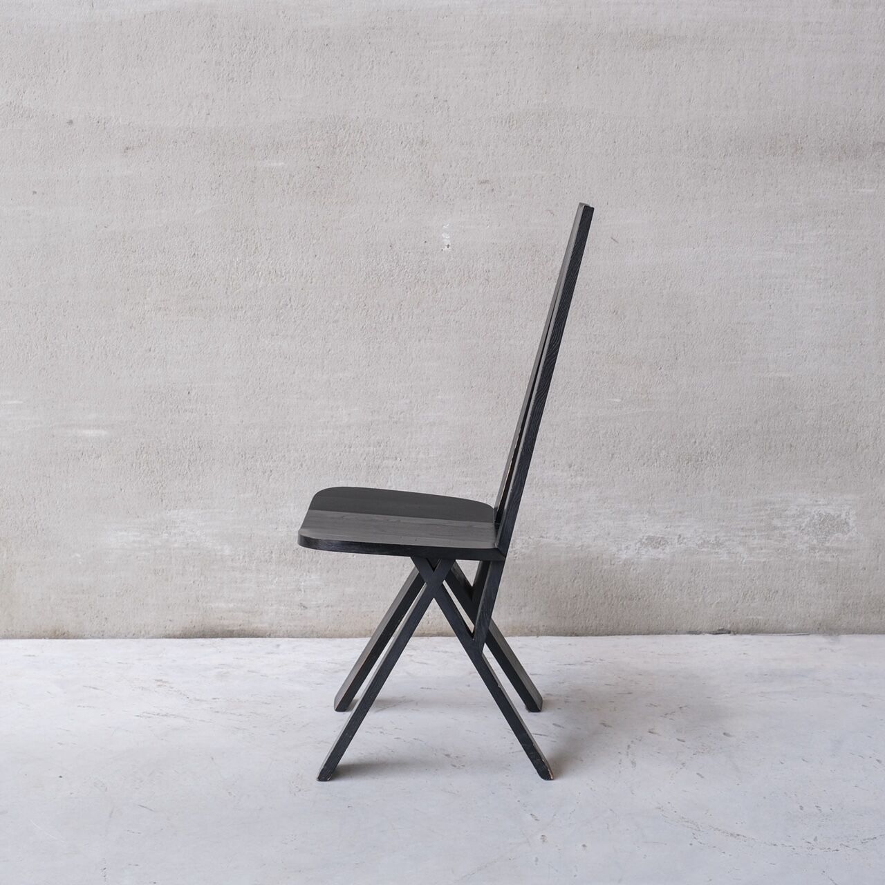 Set of six black dining chairs