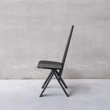 Set of six black dining chairs