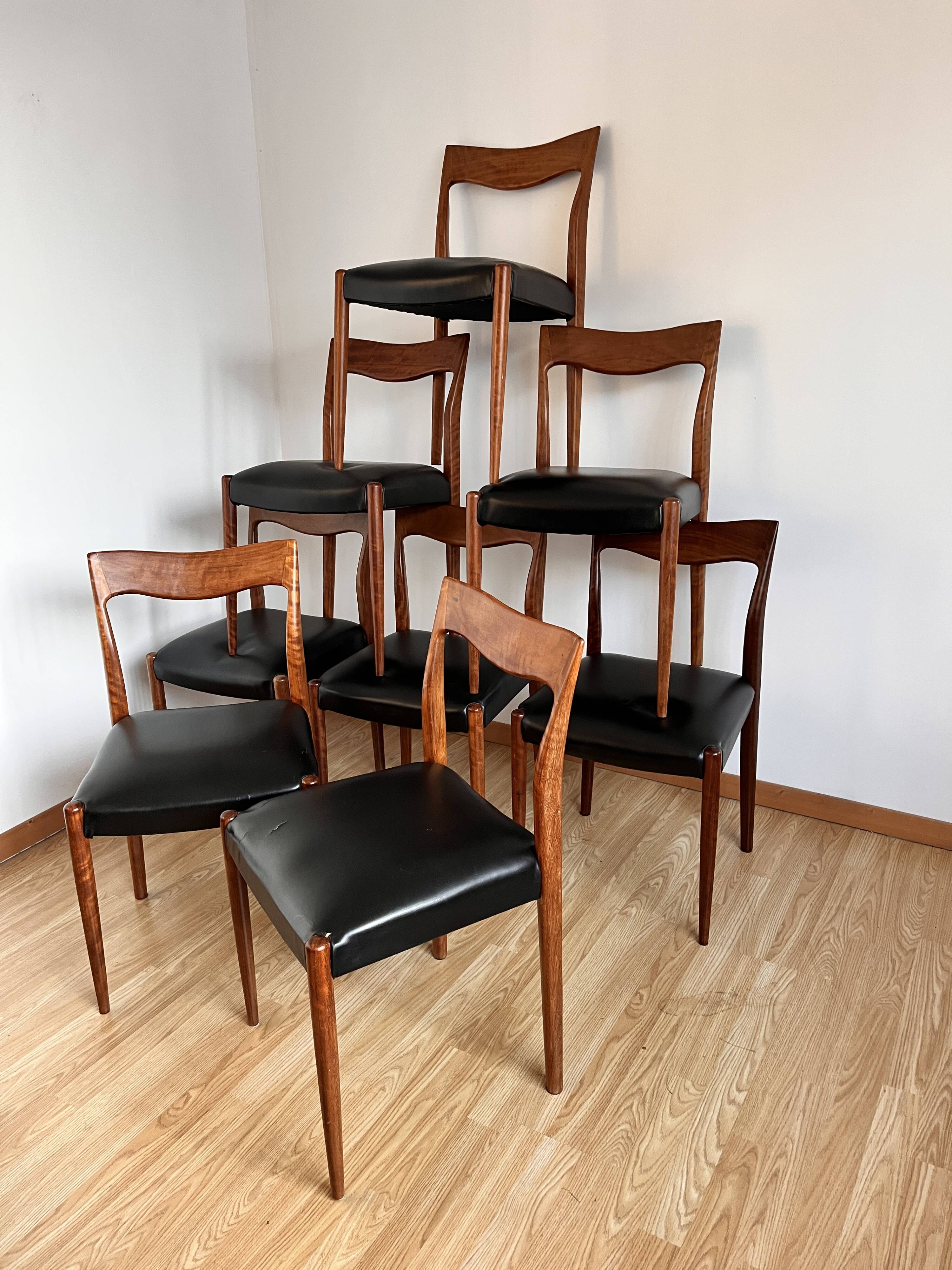 8 Scandinavian teak dining chairs