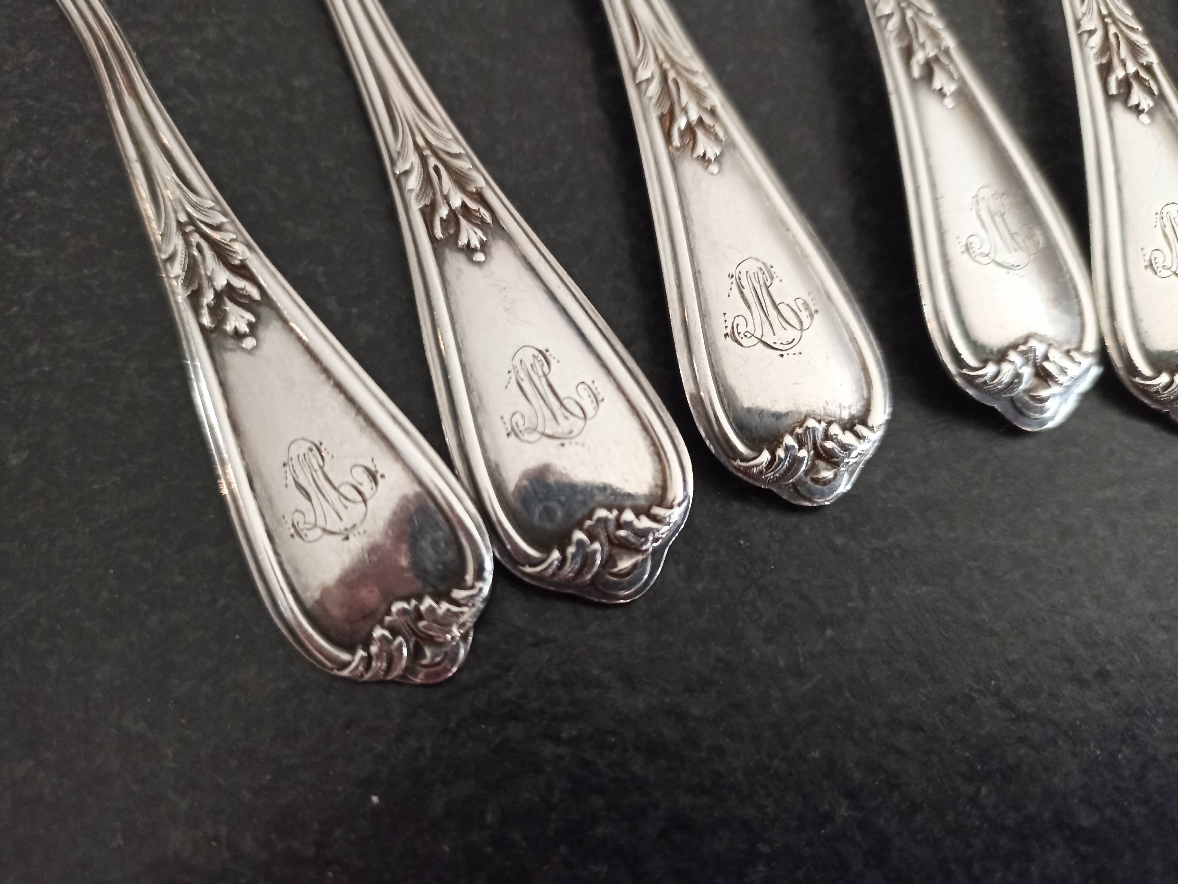 Set of 9 small silver spoons Henri Soufflot