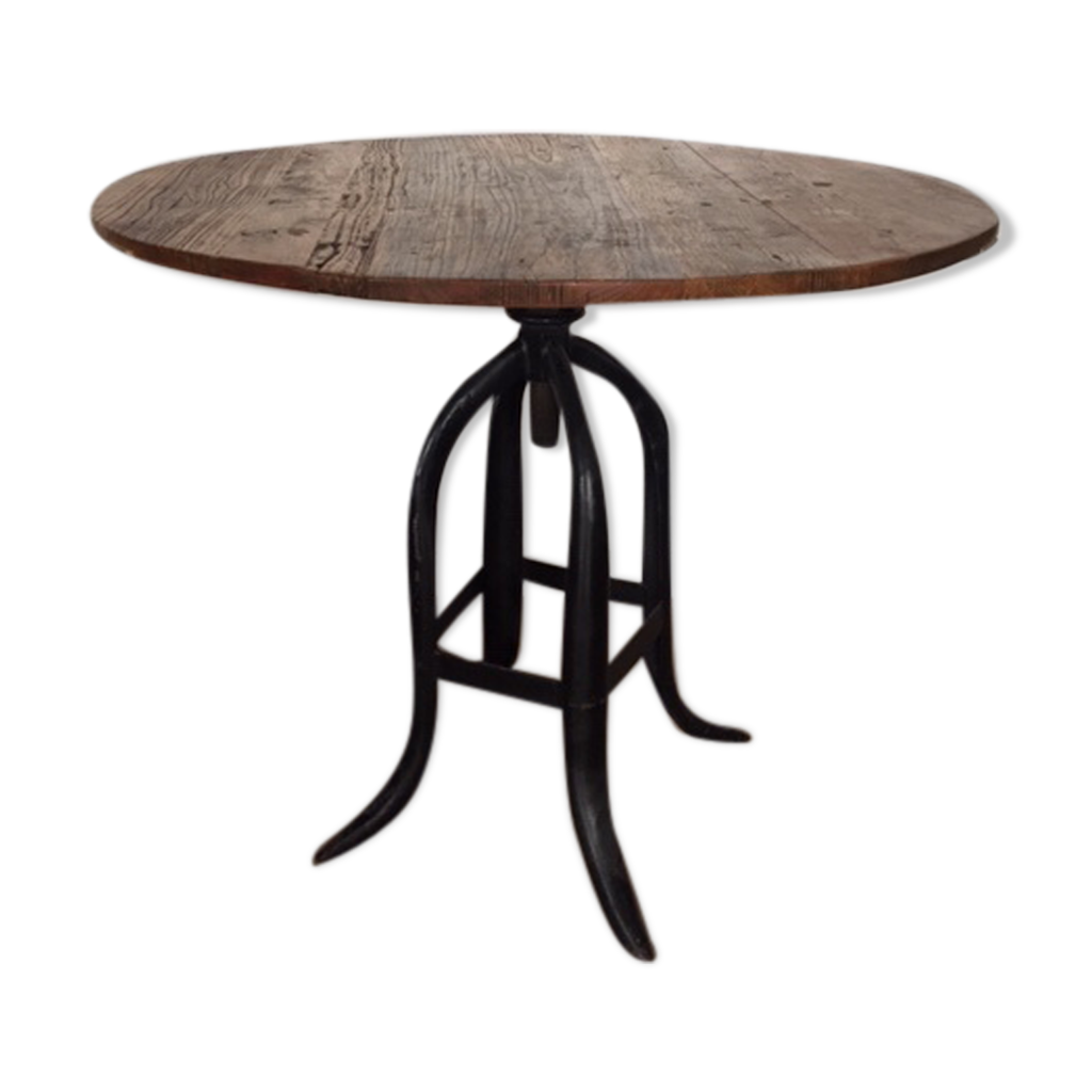 Round wrought iron table deals