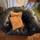 Canapé Chesterfield cuir noir + paire de fauteuils