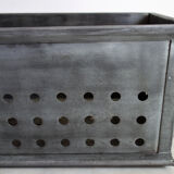 Old industrial box perfoated metal