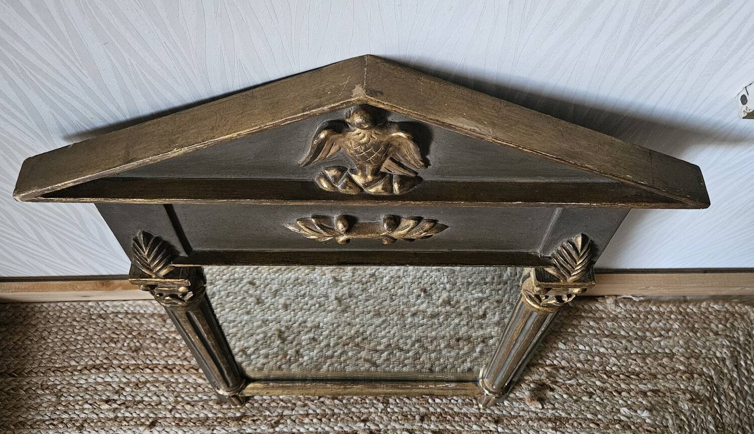 Empire style mirror from the 20th century.