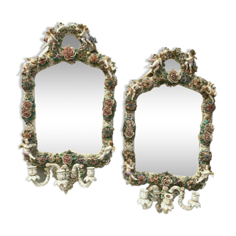 Pair of mirrors with polychrome porcelain candlesticks German Porcelain