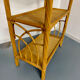 Large woven rattan bookshelf designed in the 1970s.