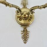 Pair of Lucien Gau "swan" wall lights in gilded bronze with bright gold and crystal