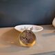 Gold and cream white saucer wall sconce