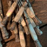 Set of coat of arms fruit cutlery