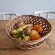 Braided wicker fruit basket