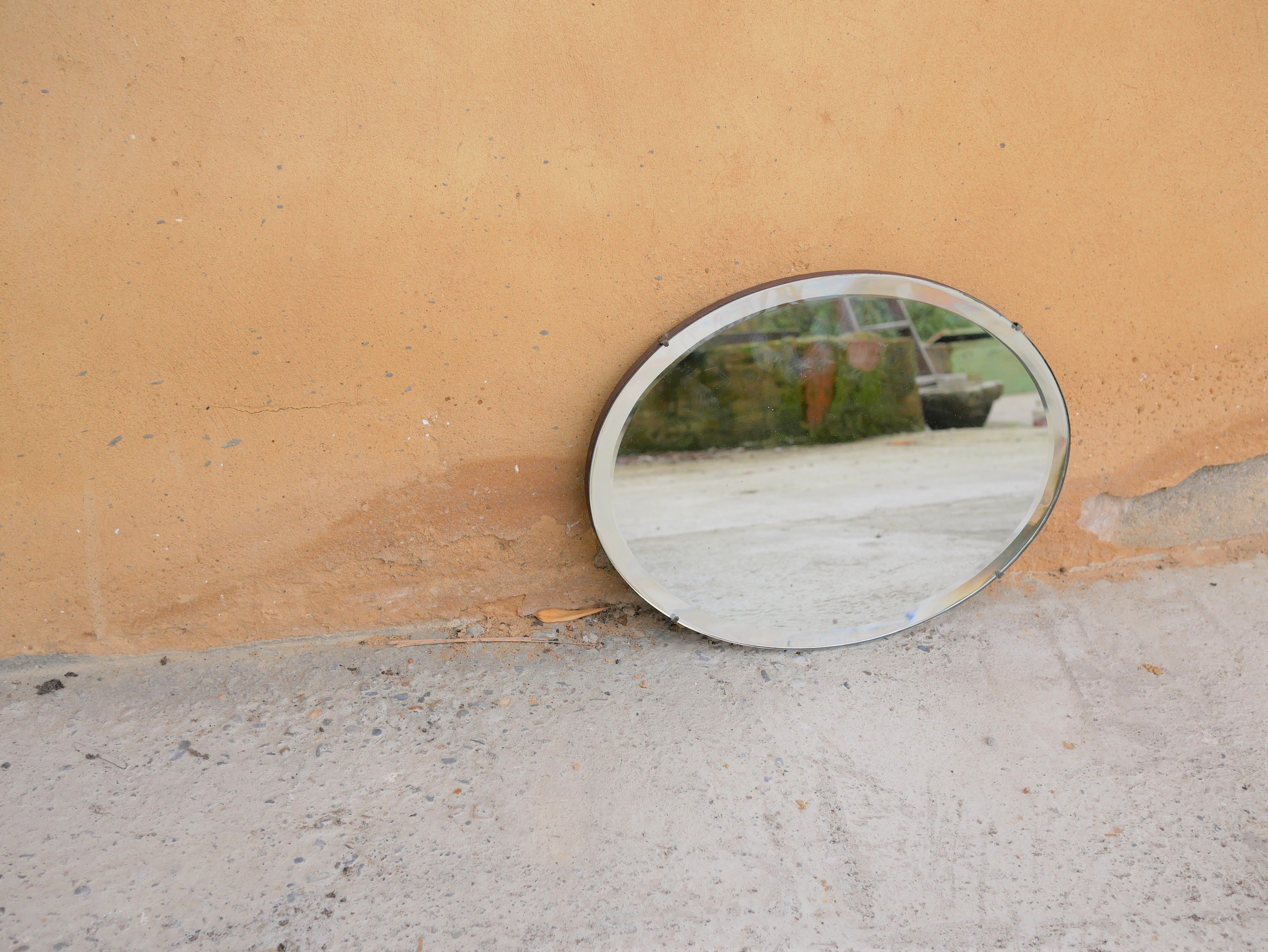 Vintage art deco bevelled oval mirror
