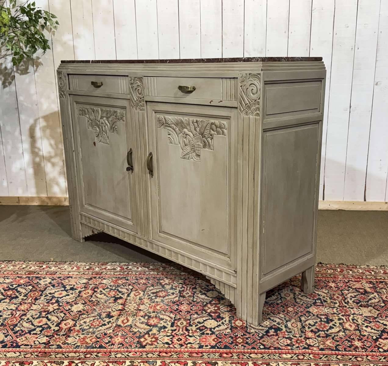 Art Deco sideboard in walnut, oak and marble top.