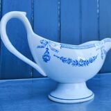 Old earthenware sauce boat