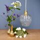 Suspension globe vintage en verre moulé transparent