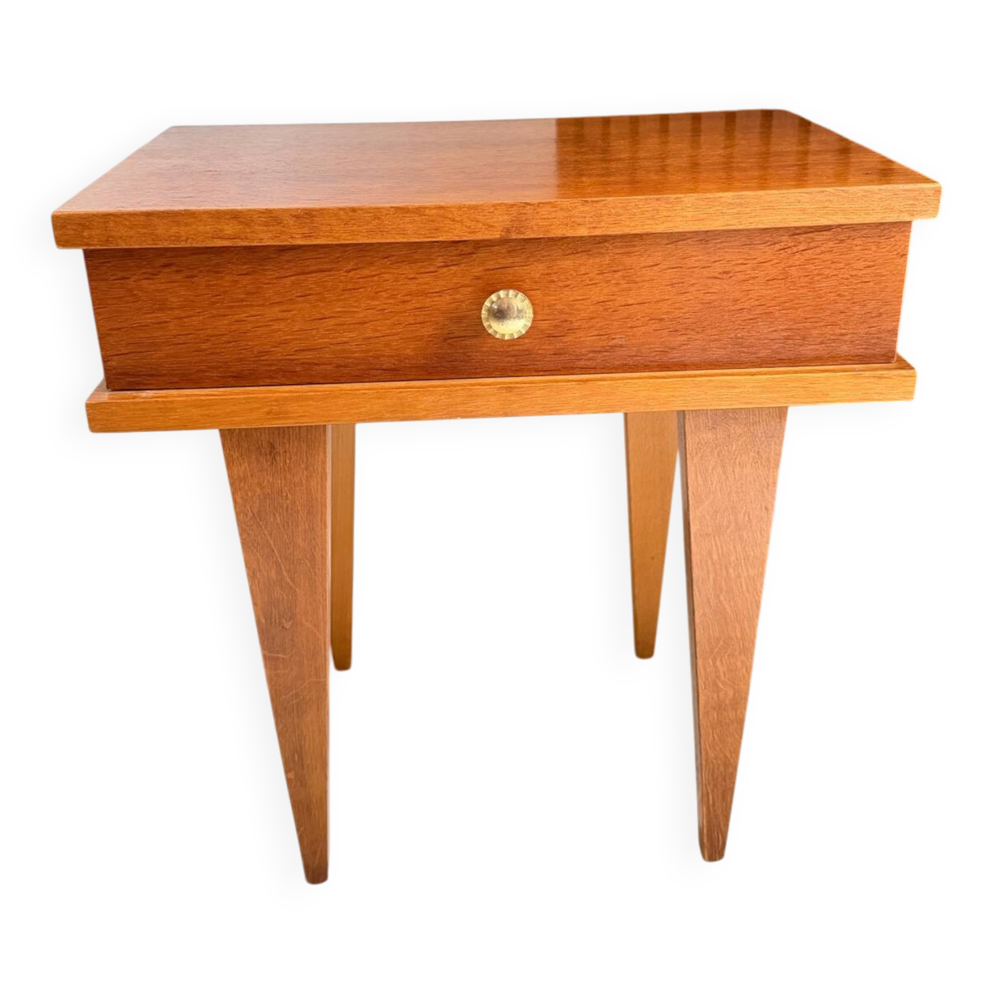 Vintage bedside table with tapered legs.