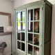Art Deco library in earthy green