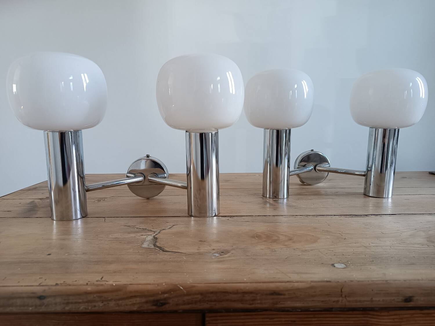 Pair of vintage wall lights in chromed metal and opaline 1970