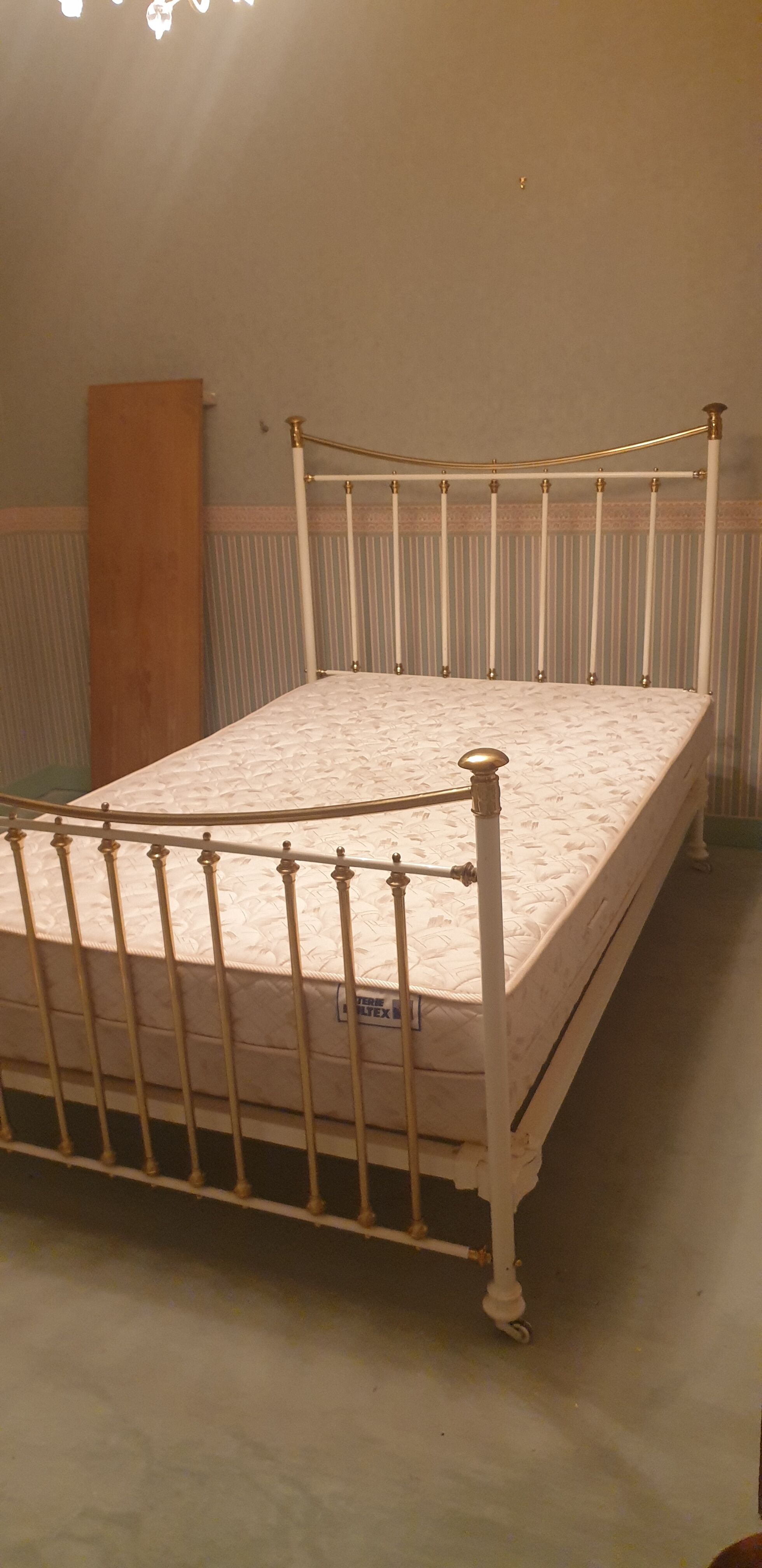 Restored old iron bed