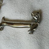 12 silver metal knife holders 6 dogs and 6 cats