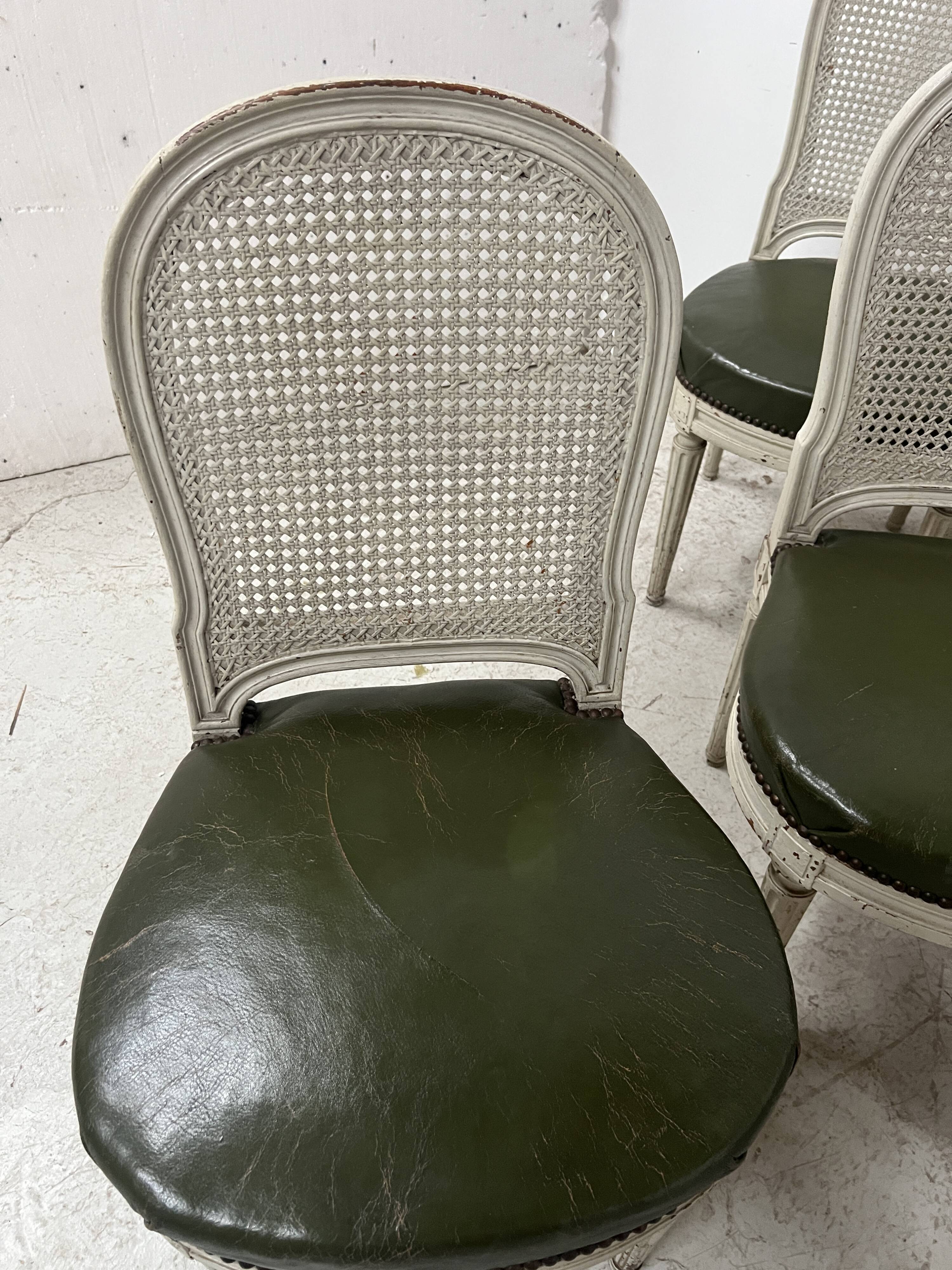 Set of seven Louis XVI style chairs in patinated beech, 20th century.