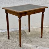 Desk XIXth Century, turned feet, walnut and leather