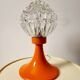 Space age lamp in orange glass and metal, around 1960.