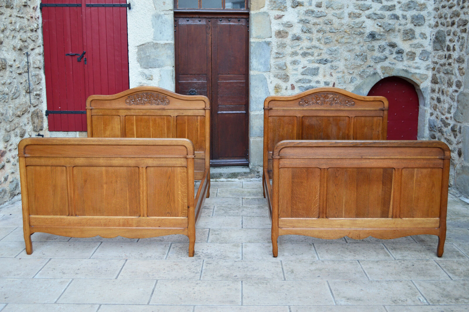 Pair of beds and Art Nouveau bedside in oak, France, circa 1910