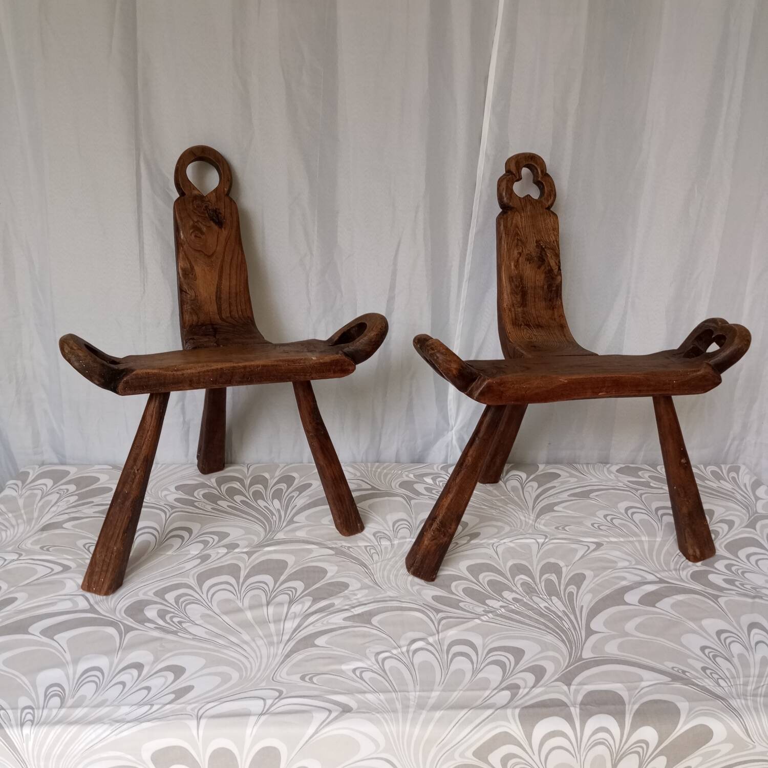 Brutalist tripod chairs in solid wood