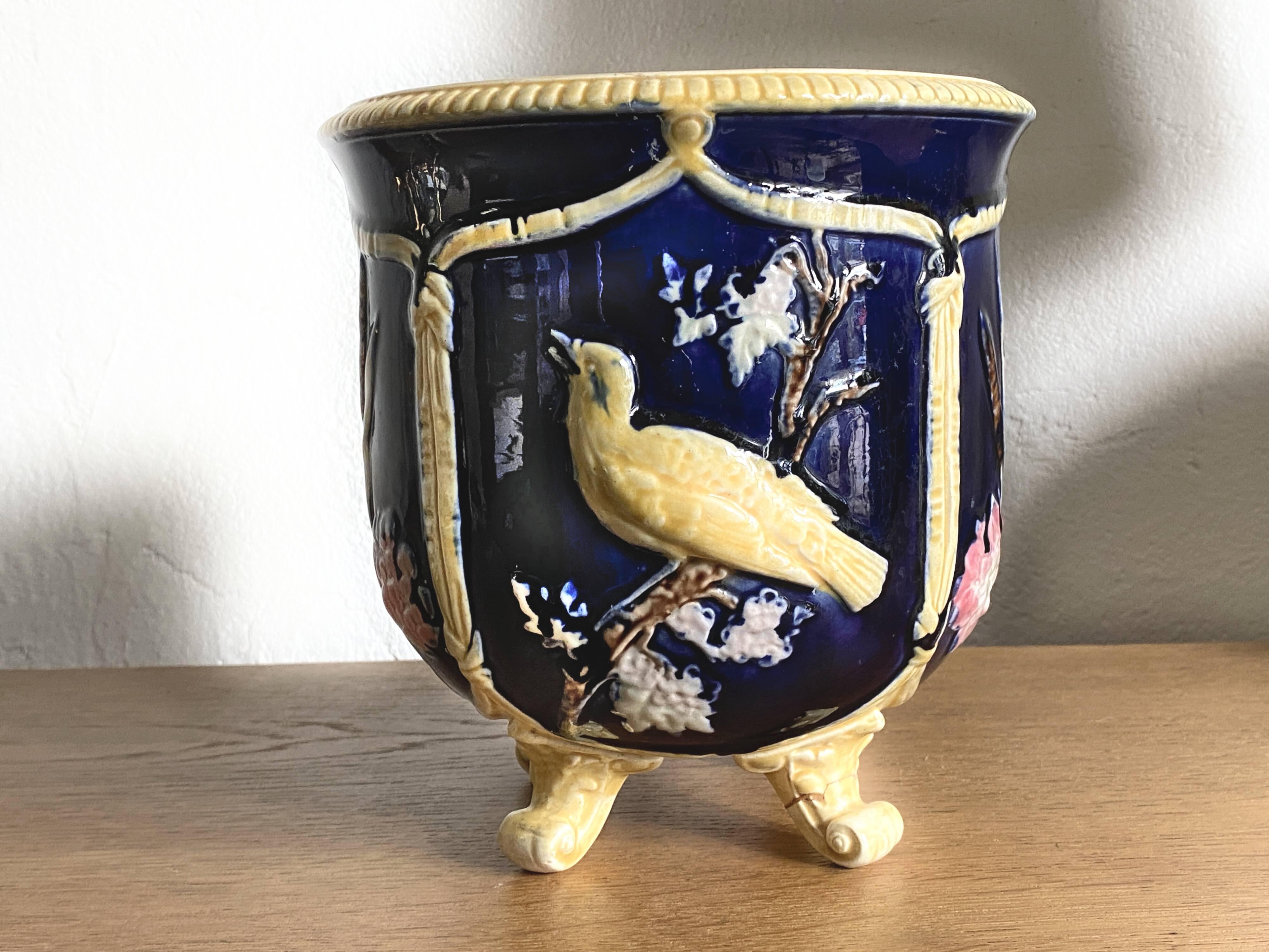 Antique earthenware flowerpot with bird decoration - circa 1900