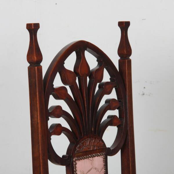 English armchair attributed to J.S. Henry, late 19th century.